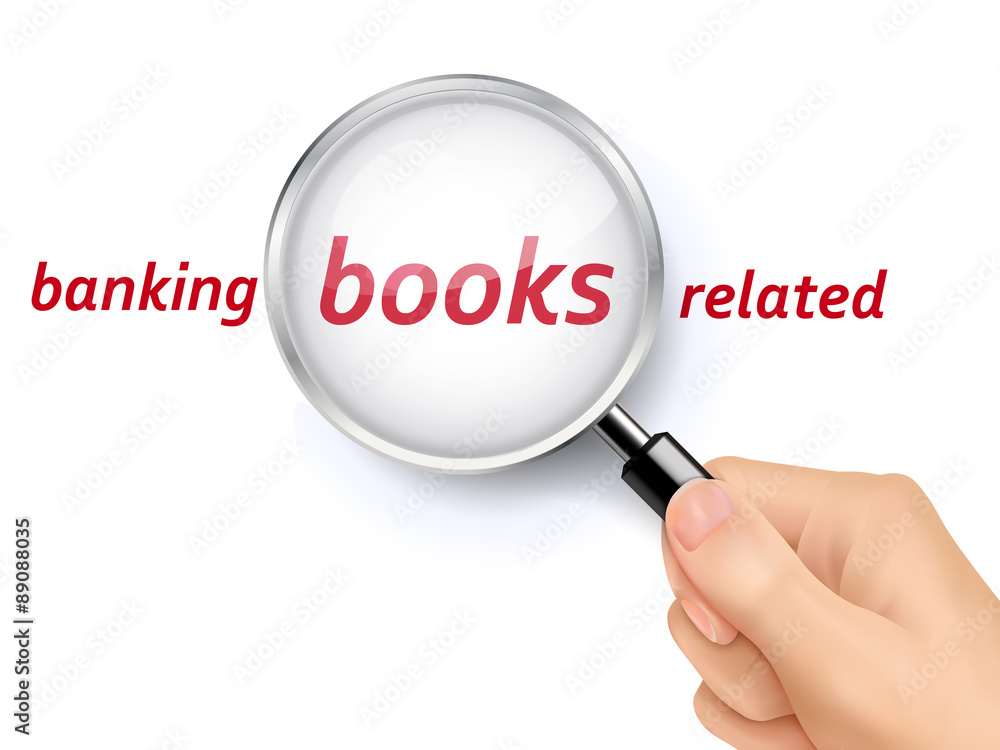 banking books related words showing through magnifying glass banking books related words showing through magnifying glass