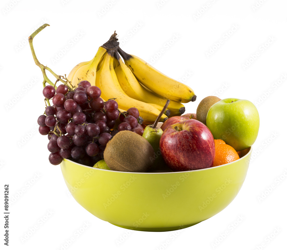 Composition with assorted fruits in big bowl isolated on white Composition with assorted fruits in big bowl isolated on white