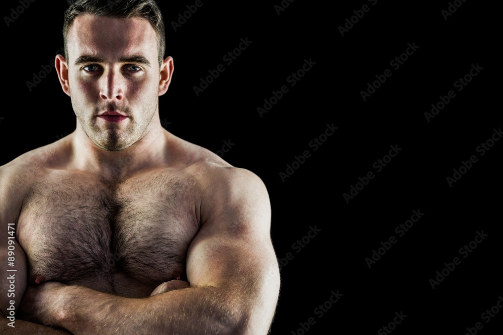 Fototapeta premium Handsome bodybuilder with arms crossed