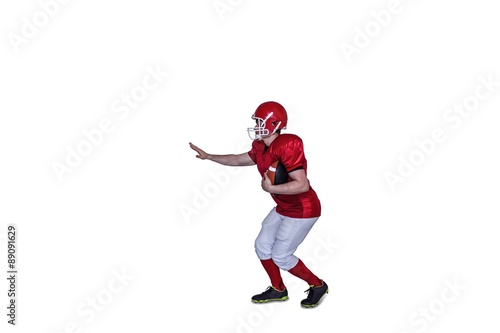 American football player running with the ball © WavebreakmediaMicro