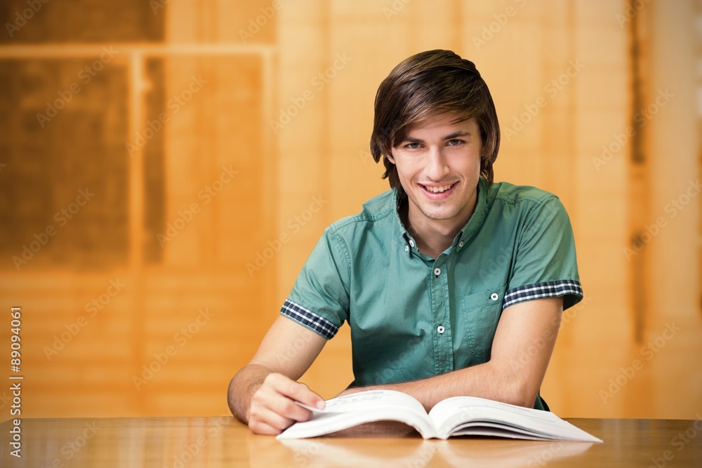 Composite image of student sitting in library reading Composite image of student sitting in library reading