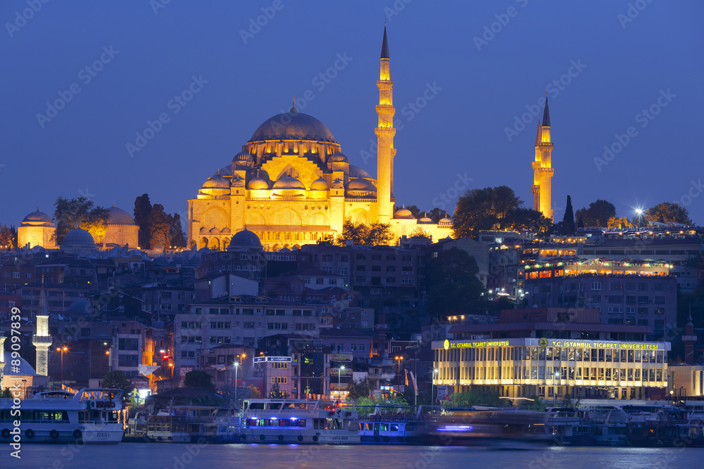 The historical center of Istanbul and Sulaymaniyah mosque in the night. View from the Golden Horn