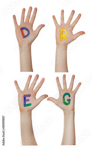 Alphabet (letters) painted on children hands.  Rises up hands. 