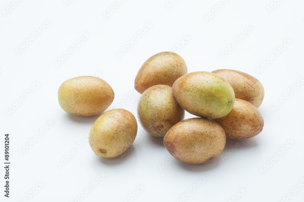 Fresh wampee fruit on white background, Wampee fruit is a tropical fruit native to southern China. Fresh wampee fruit on white background, Wampee fruit is a tropical fruit native to southern China.