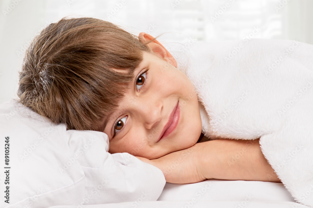 Little girl in the bed