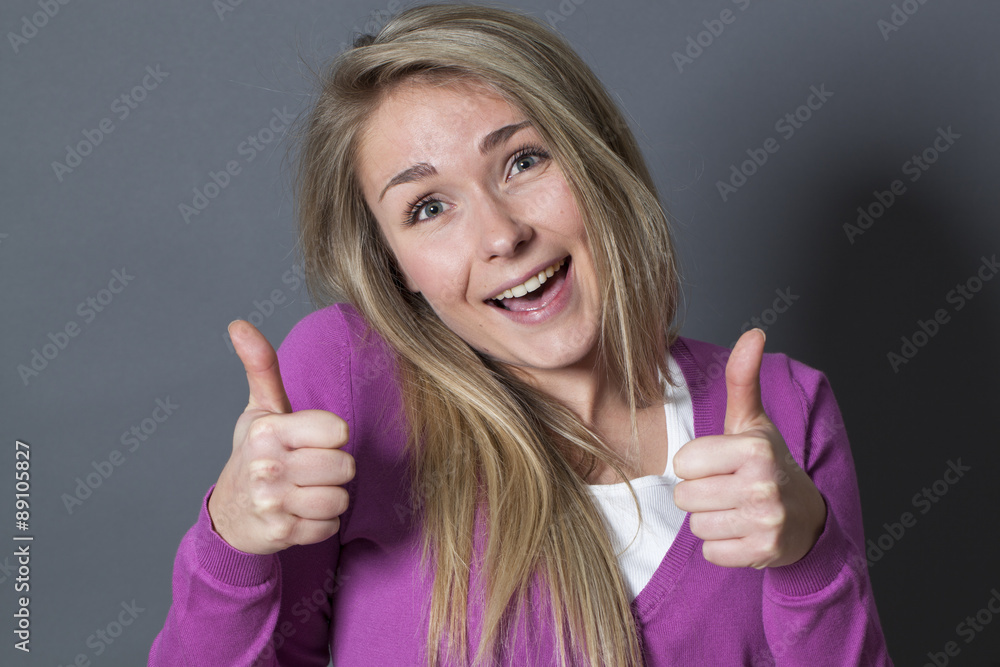 extrovert 20s woman with double thumbs up extrovert 20s woman with double thumbs up