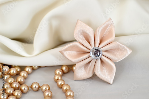 Wedding accessories. Handmade silk kanzashi flower and pearls