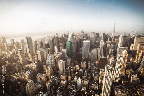Beautiful aerial view of Manhattan skyline at sunset in summer, New York City, USA