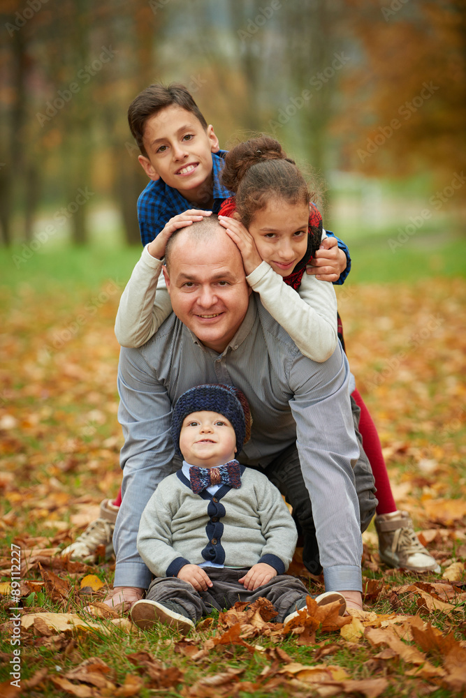 Fototapeta premium happy family in autumn park