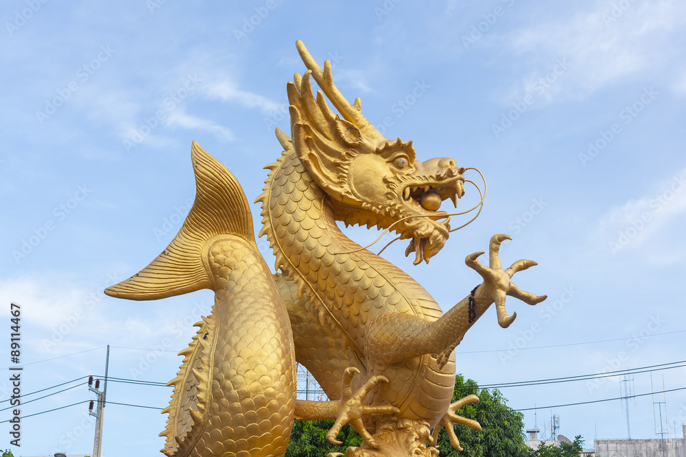 Golden dragon statue at Phuket , Thailand