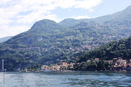 Lake Como view towards Menaggio under blue sky in Lombardy Italy 