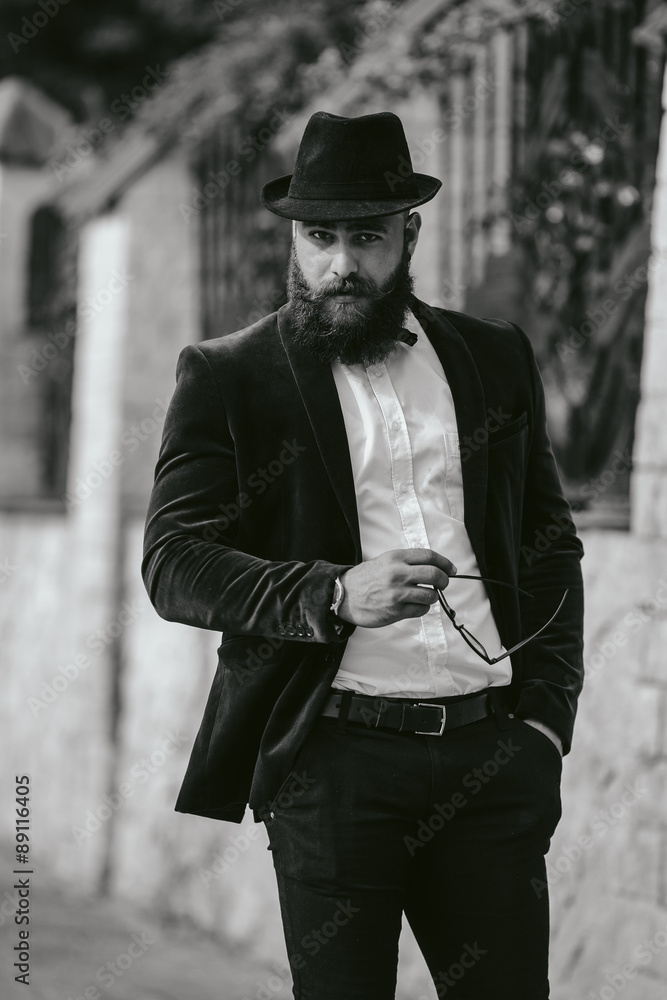 rich man with a beard, thinking about business rich man with a beard, thinking about business