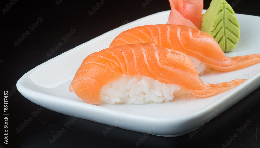 japanese cuisine. sushi salmon on the background