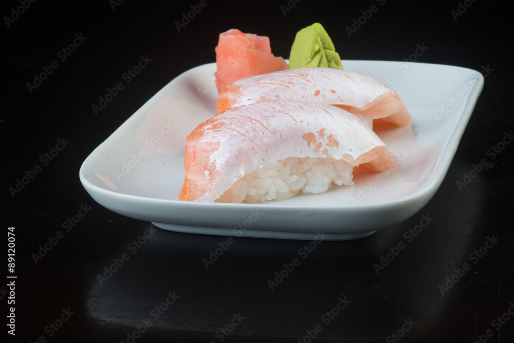 japanese cuisine. sushi salmon on the background japanese cuisine. sushi salmon on the background