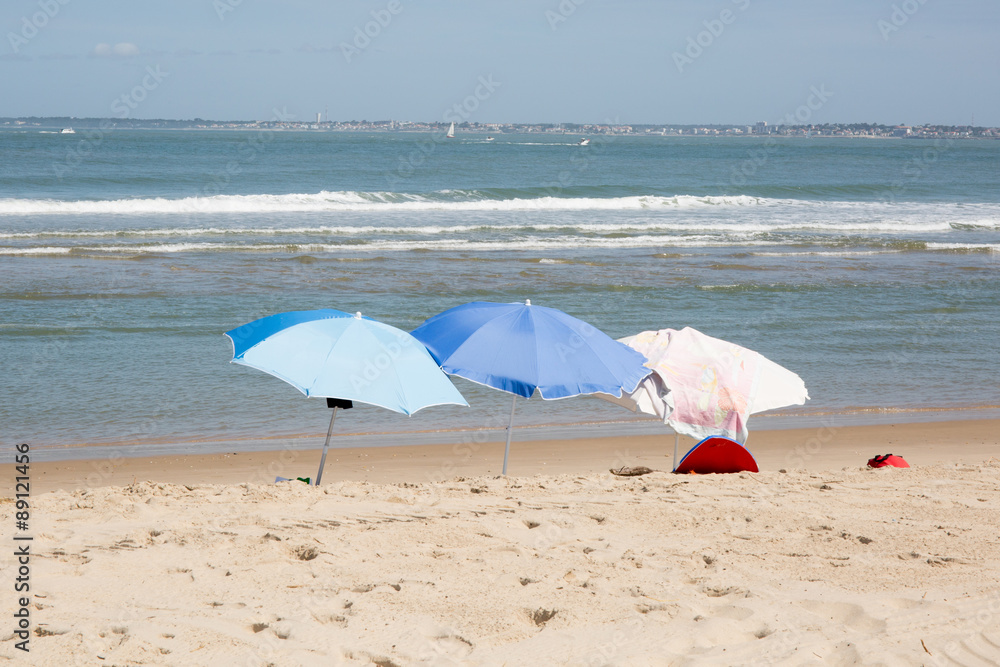 Three umbrella on the beach Three umbrella on the beach