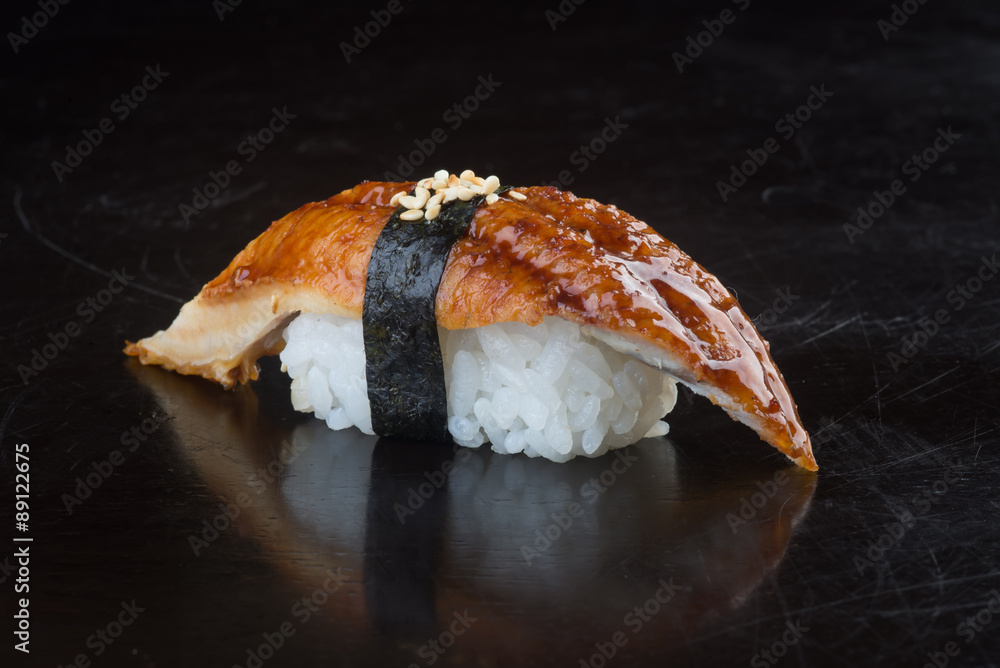 japanese cuisine. sushi unagi on the background japanese cuisine. sushi unagi on the background