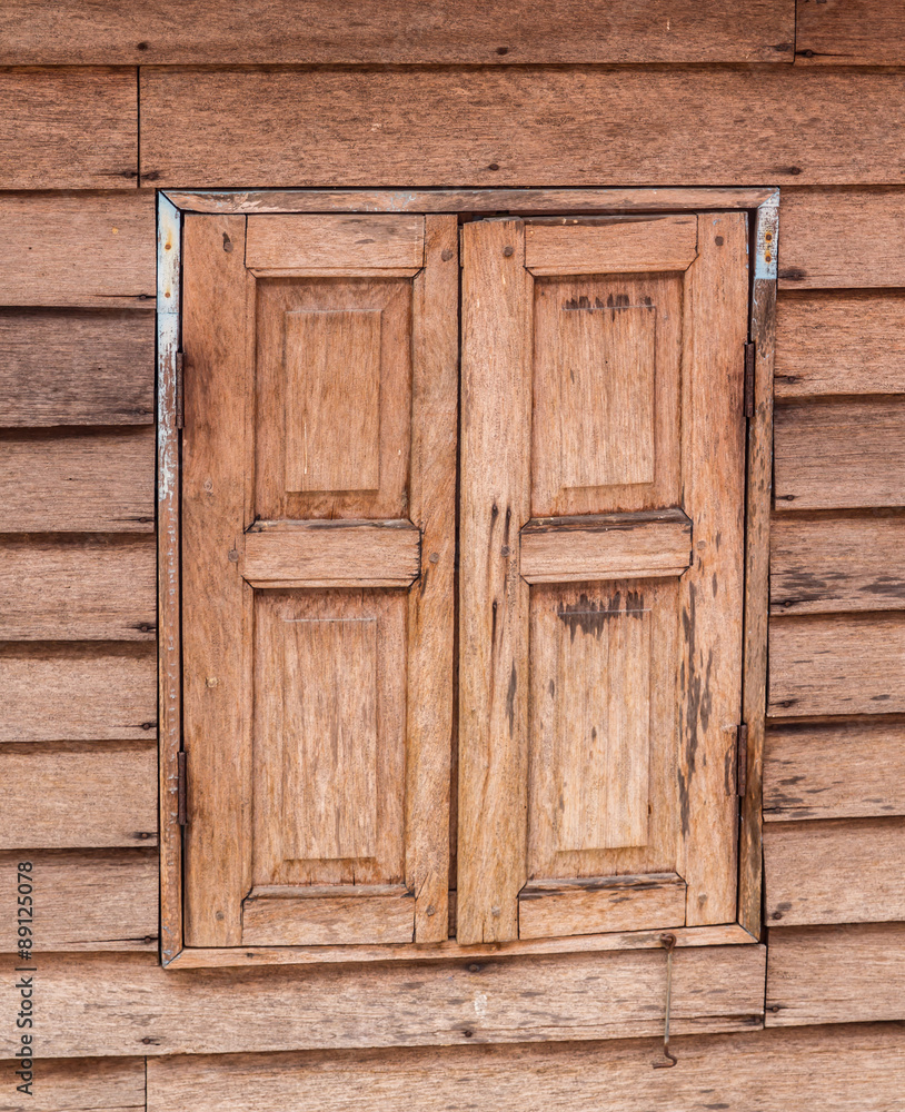 Old weathered wooden window with hinges Old weathered wooden window with hinges
