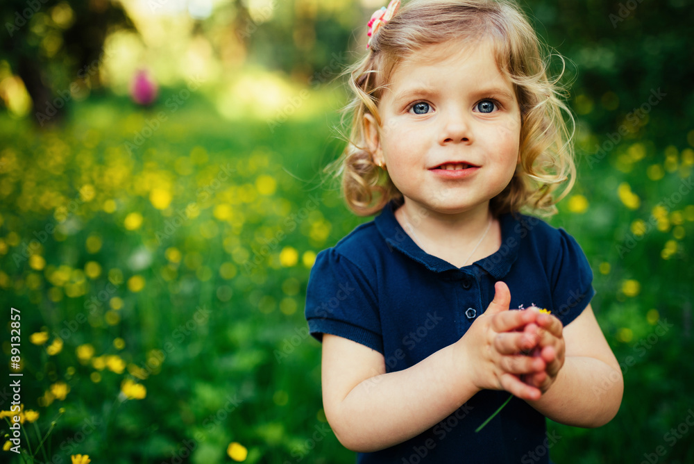 child playing outdoors in the grass child playing outdoors in the grass