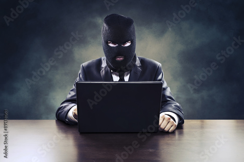 Canvas Print Business espionage hacker stealing corporate information or government surveilla