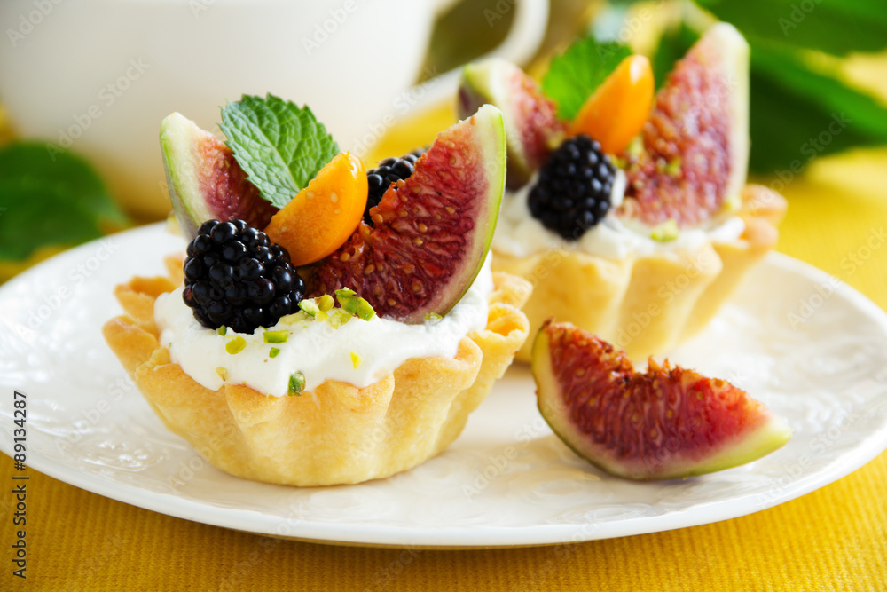 Tartlets with whipped cream and fresh figs. Tartlets with whipped cream and fresh figs.