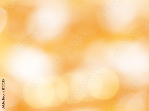 Abstract photo of backlight reflector and glitter bokeh lights background. Image is blurred and made with colorful filters.