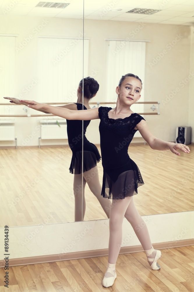a little girl dressed as a ballerina in ballet a little girl dressed as a ballerina in ballet