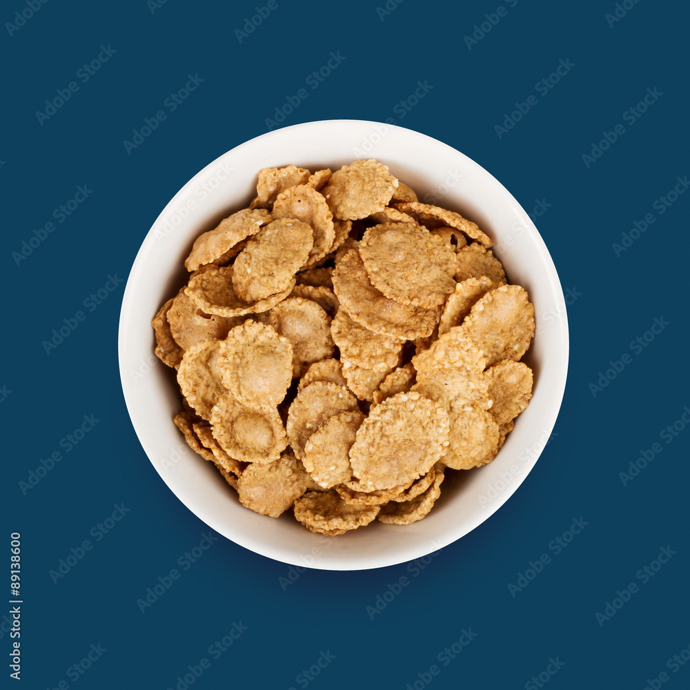 Multigrain flakes in small white plate Multigrain flakes in small white plate