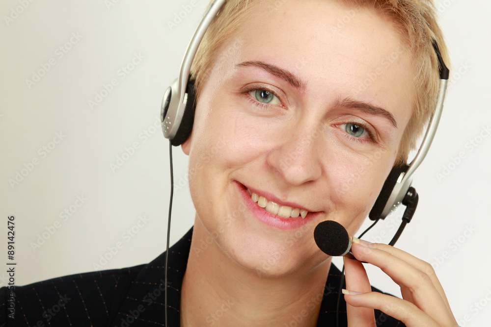 Happy friendly service agent in call centre Happy friendly service agent in call centre