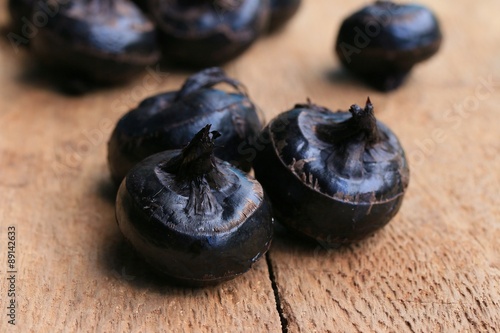 Chinese water chestnut on wood vintage