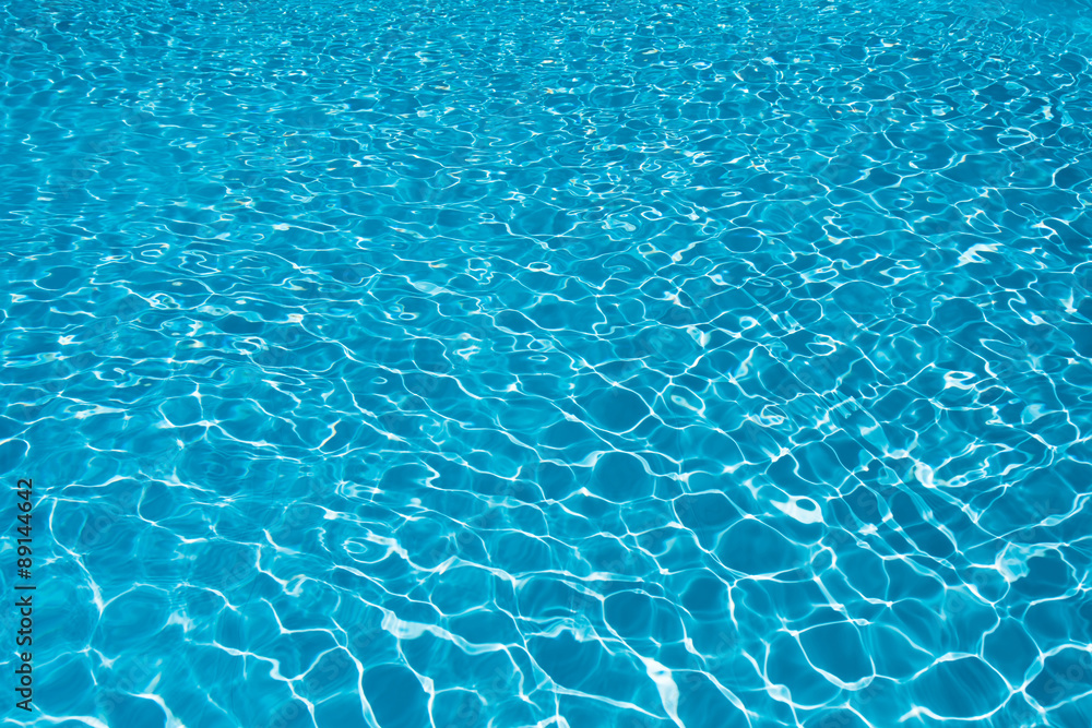 Blue water surface in swimming pool