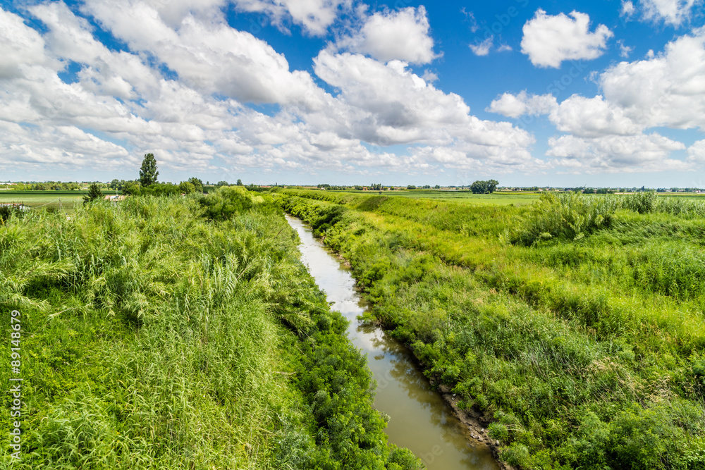 Naklejka premium river in the countryside in the north of Italy