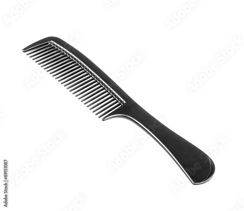 Black comb isolated on white close up look