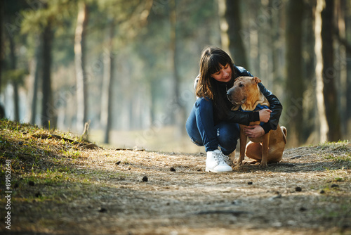 Photography girl with dog in the park