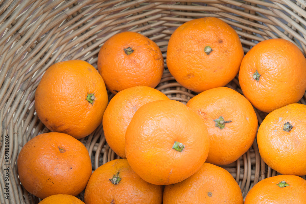 Oranges in basket, close-up. Oranges in basket, close-up.