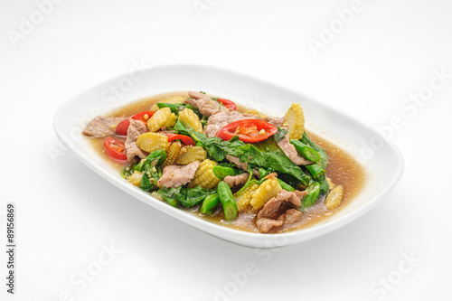 Pork stew with pineapple in sweet sauce isolated on white