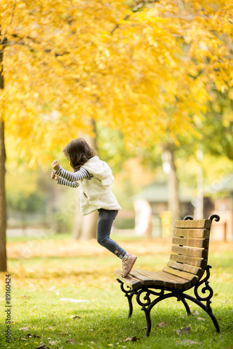 Little girl at the bench