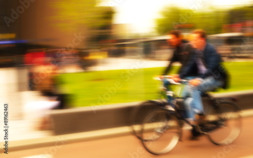 blur two bicycle with two men
