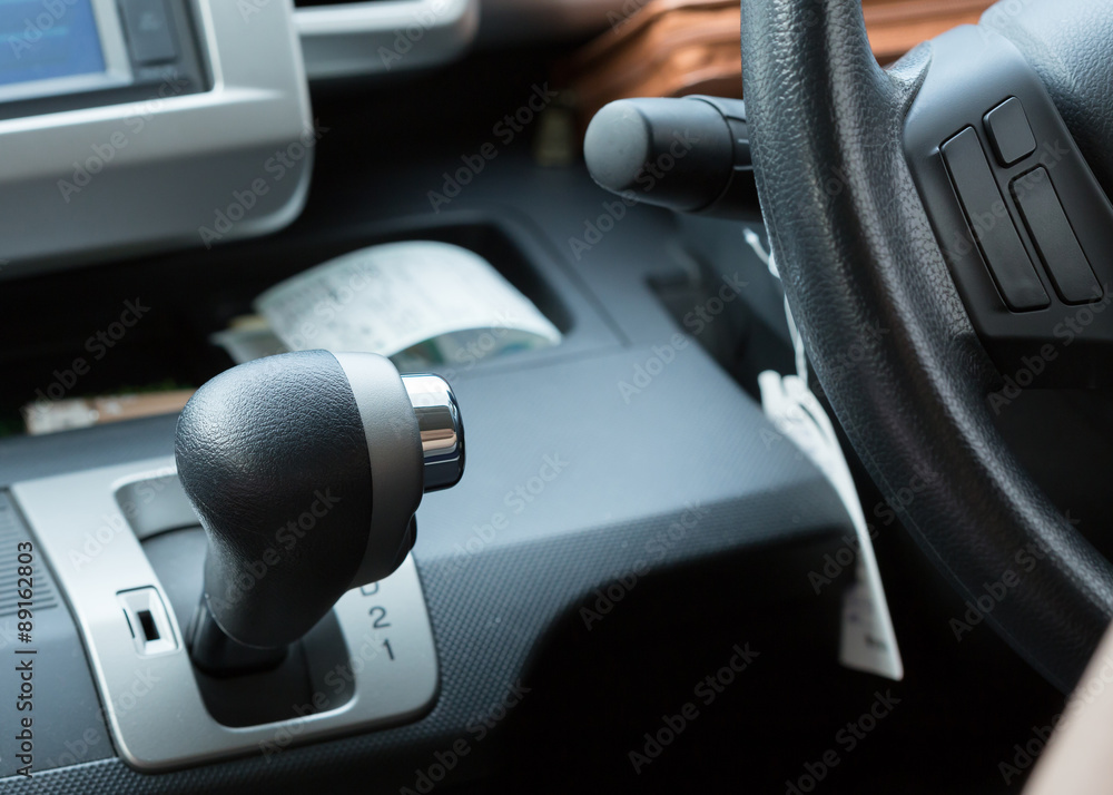 car automatic gear with black steering wheel