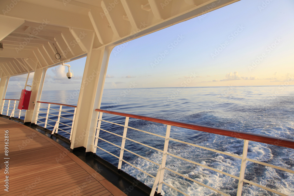 Looking out the Stern of a Cruise Ship as the Sun sets Looking out the Stern of a Cruise Ship as the Sun sets