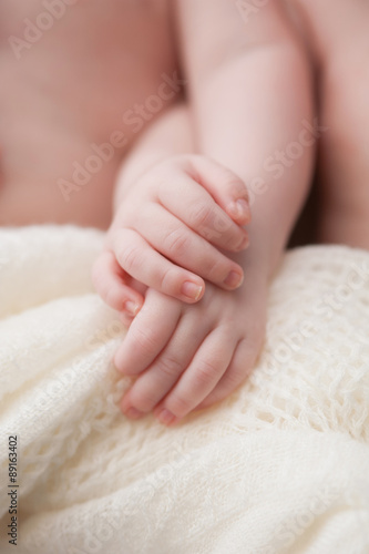 Twin Baby Girls Holding Hands