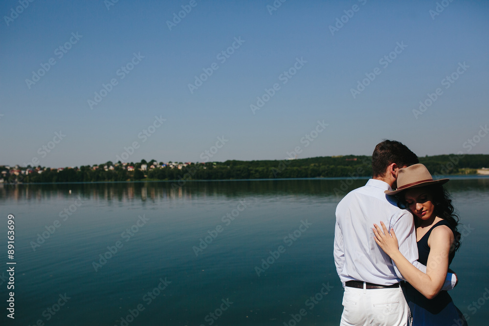 couple spends time on the wooden pier