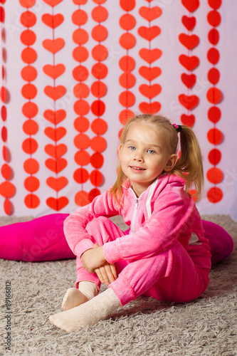 little girl in pink trendy sportswear