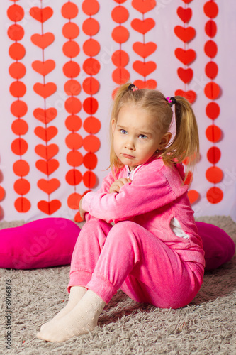 little girl in pink trendy sportswear