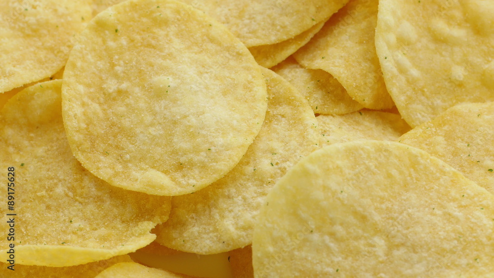 Tasty potato chips. Potato chips, close-up 4K footage.
Tasty potato chips. Potato chips, close-up 4K footage.