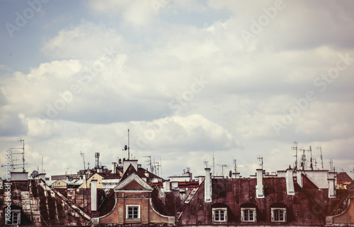 Old roofs and sky with clouds