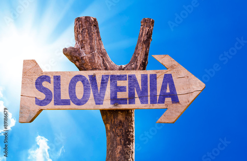 Slovenia wooden sign with sky background photo