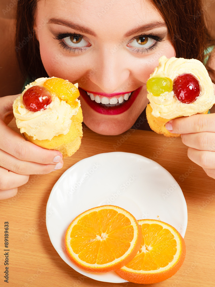 Woman taking delicious sweet cake. Gluttony. Woman taking delicious sweet cake. Gluttony.