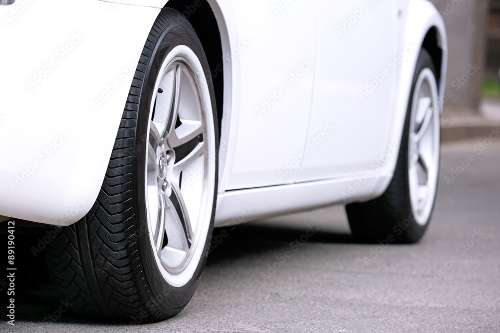 Car wheels outdoors close up