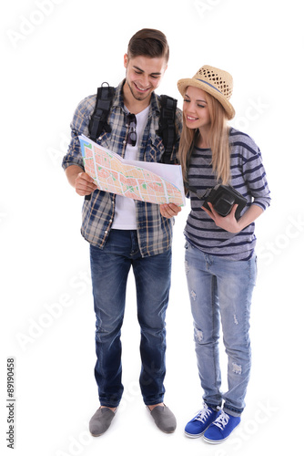 Pair of travelers with map ...