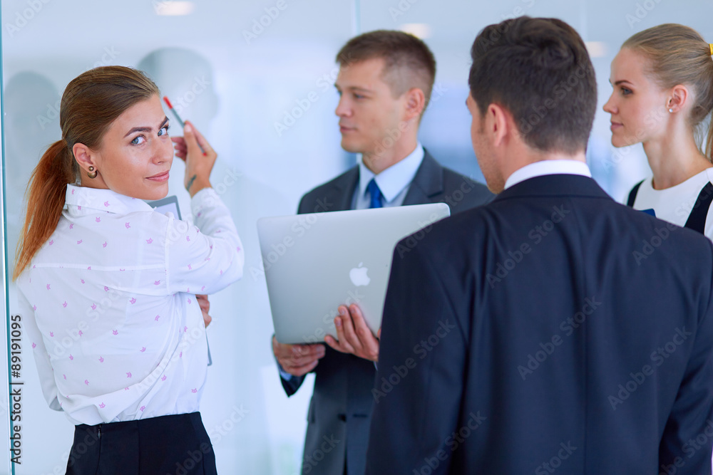 Group of business people doing presentation with laptop during Group of business people doing presentation with laptop during
